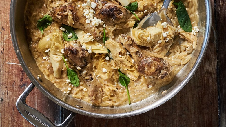 chicken and orzo in a skillet