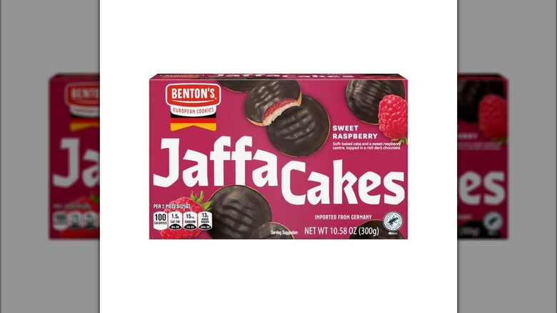 A magenta box of Benton's Raspberry Jaffa Cakes on white background