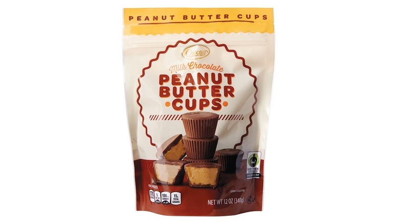 Bag of milk chocolate peanut butter cups with image of cups on front, some sliced open to show peanut butter inside