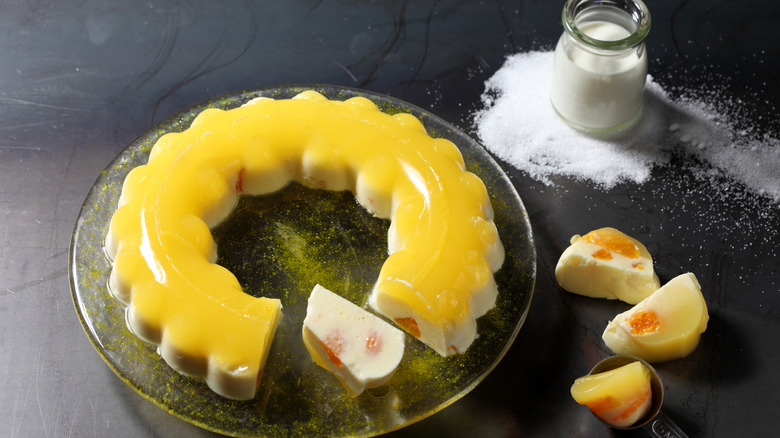 yellow jell-o salad ring on a plate