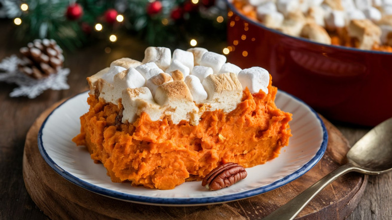 Portion of marshmallow-topped sweet potato casserole on plate