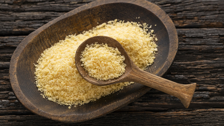 Panko breadcrumbs in wooden bowl with wooden spoon