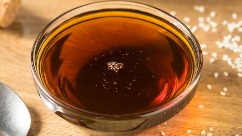 Sesame oil in small glass bowl