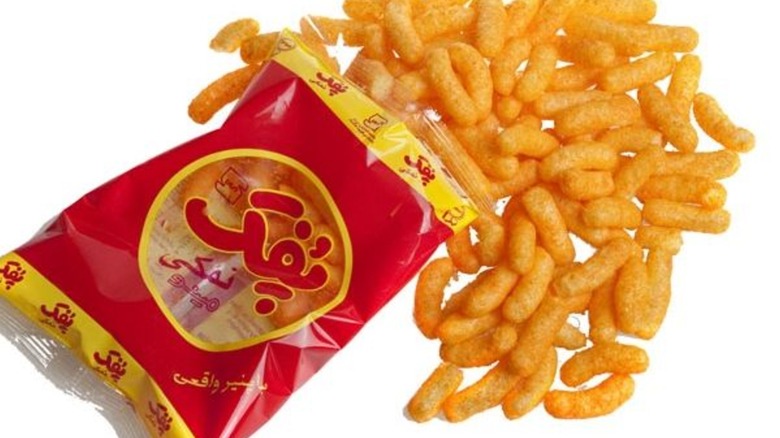 Pofak pouring out of a bag of Minoo pofak namaki onto a white surface