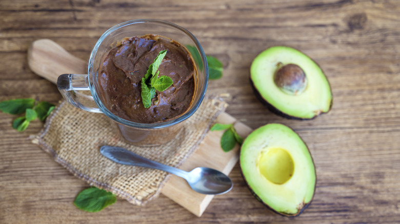 Hass avocado mousse surrounded by ingredients