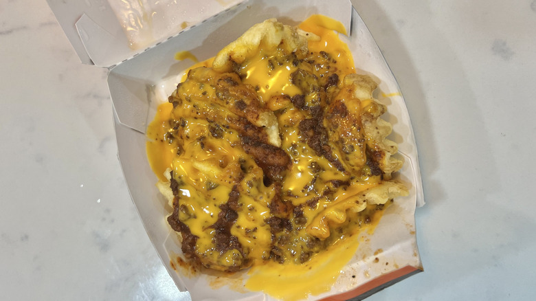 A&W chili cheese fries in to-go box.