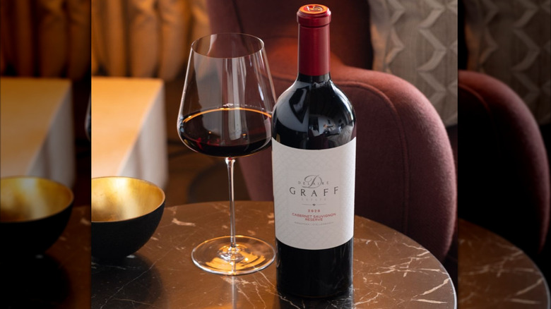 bottle and glass of red wine