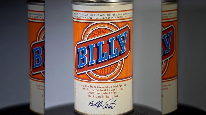 mirrored image of vintage Billy Beer can against grey background