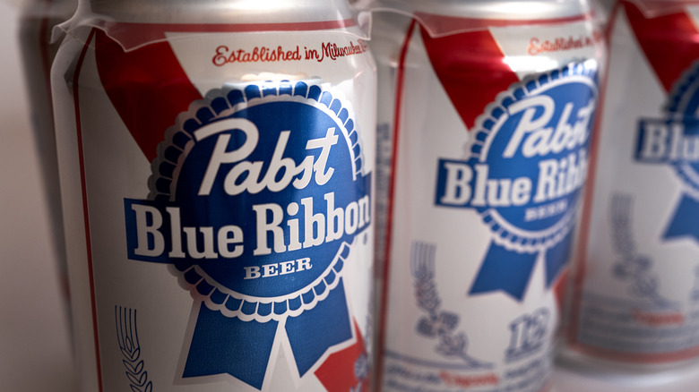 close up of Pabst Blue Ribbon cans