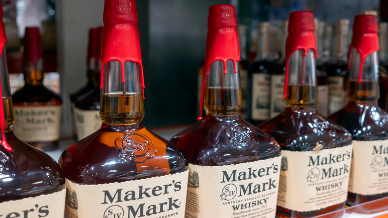 bottles of maker's mark bourbon on a store shelf