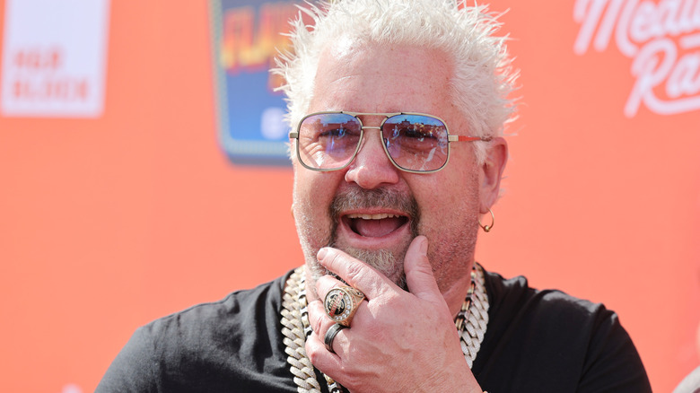 Guy Fieri laughing outside