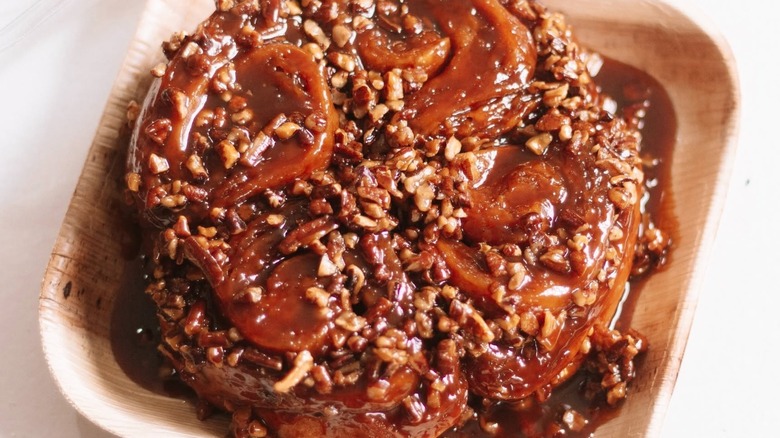 Sticky buns with pecans in a tray