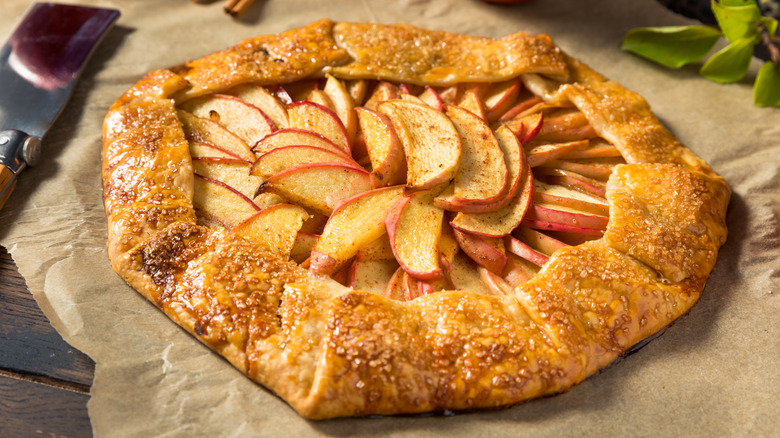Homemade apple galette on parchment paper