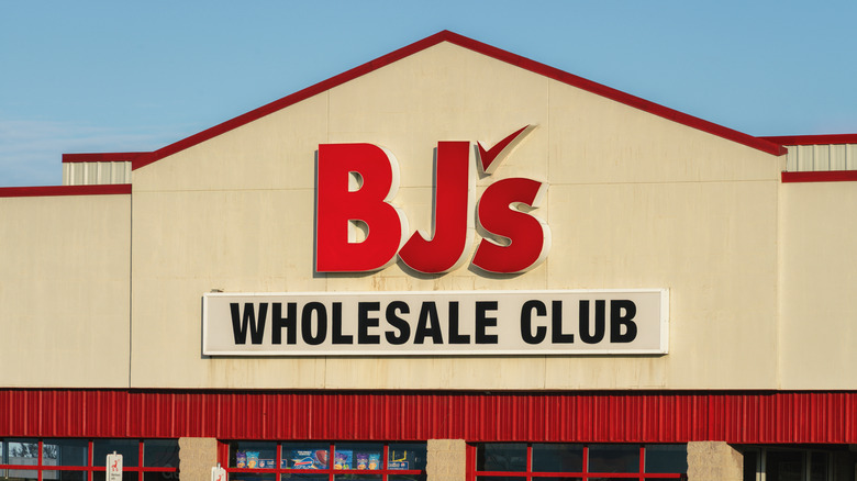 Red BJ's Wholesale Club sign on beige building