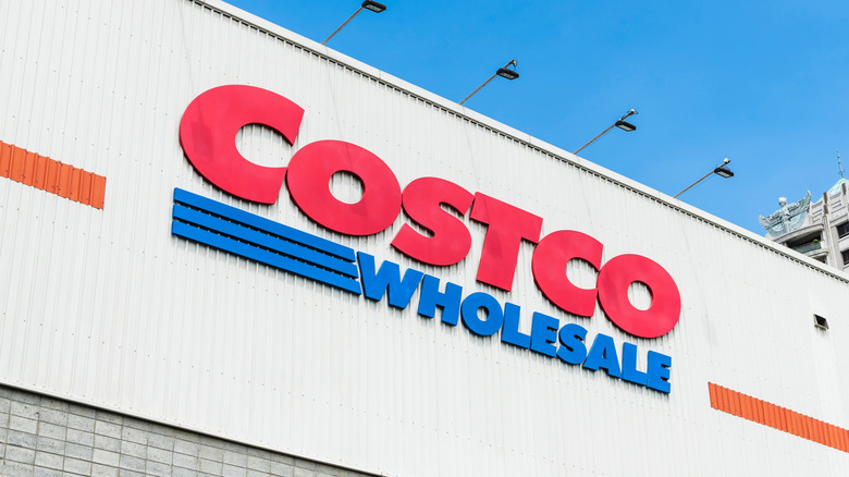 Costco Wholesale sign on white building