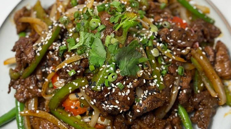 Beef dish sprinkled with sesame seeds at Silk Road Uyghur Cuisine