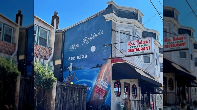 Mural with a gondolier on the side of Mrs. Robino's building