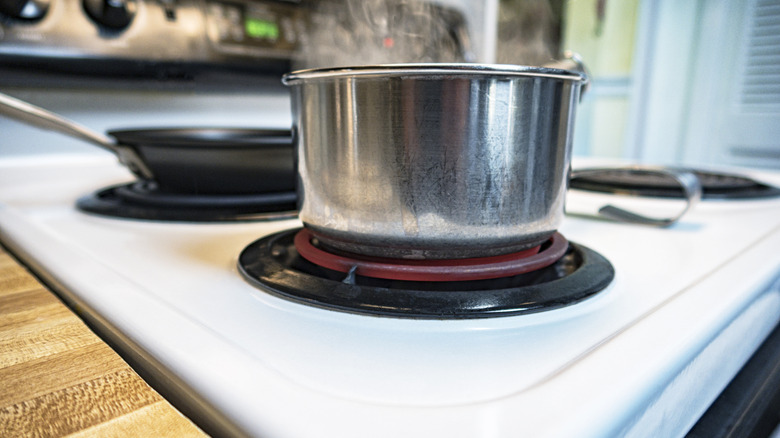 A pot and pan on an electric burner