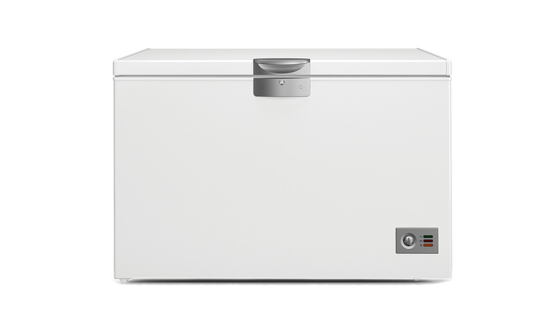 Closed deep freezer with a white background