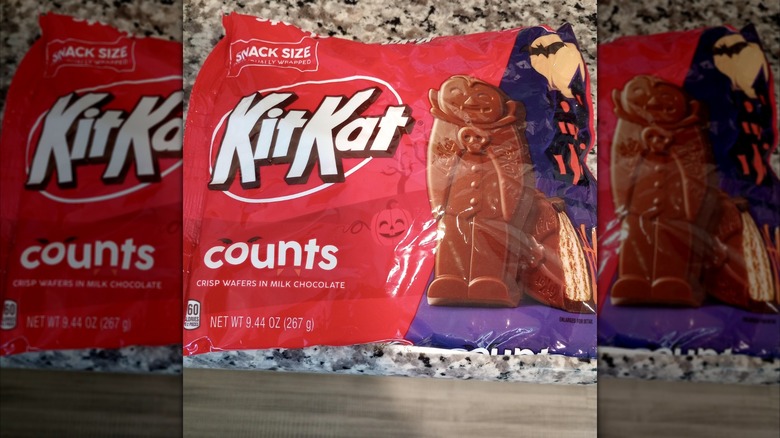 Red package of KitKat counts on a counter