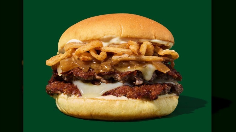 Shake Shack French Onion Soup Burger on green background