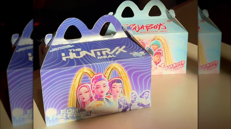 Two different KPop Demon Hunters McDonald's meal boxes