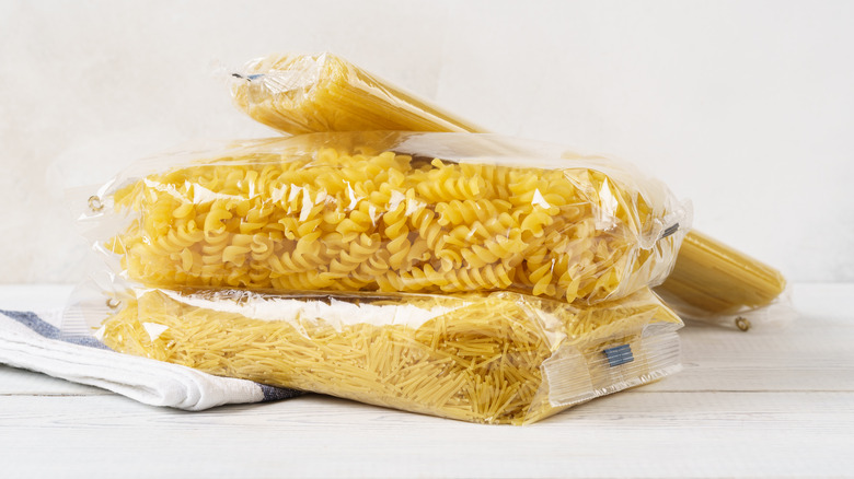 Various types of pasta in plastic packaging