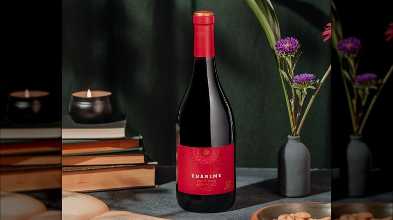 bottle of red wine on table