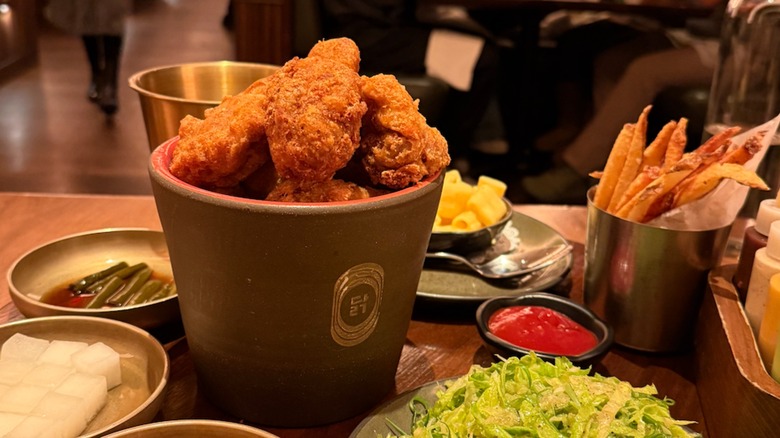 close up of a bucket of fried chicken at Coqodaq in NYC