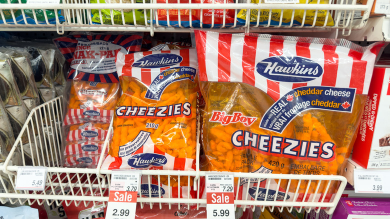 A view of several packages of Hawkins Big Boy Cheezies chips, on display at a local grocery store.