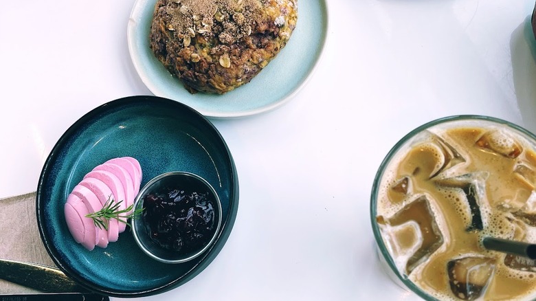 Freya Cafe brunch plates with beet boiled egg and jam sliced on plates with iced coffee