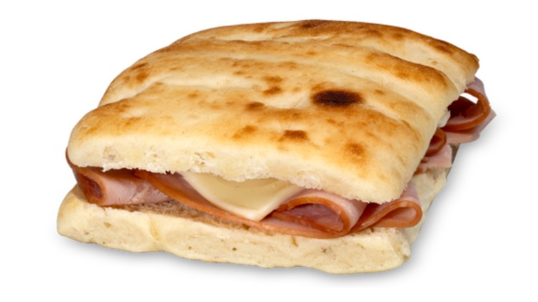 Ham and Swiss flatbread from Kwik Trip on white background
