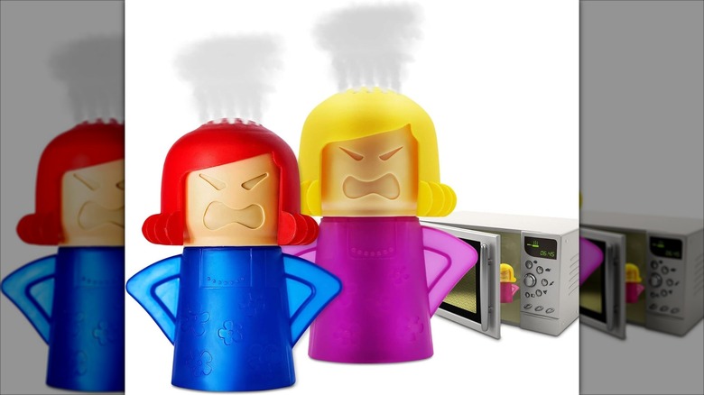 Two Angry Mama microwave cleaners blowing steam with a microwave in the background