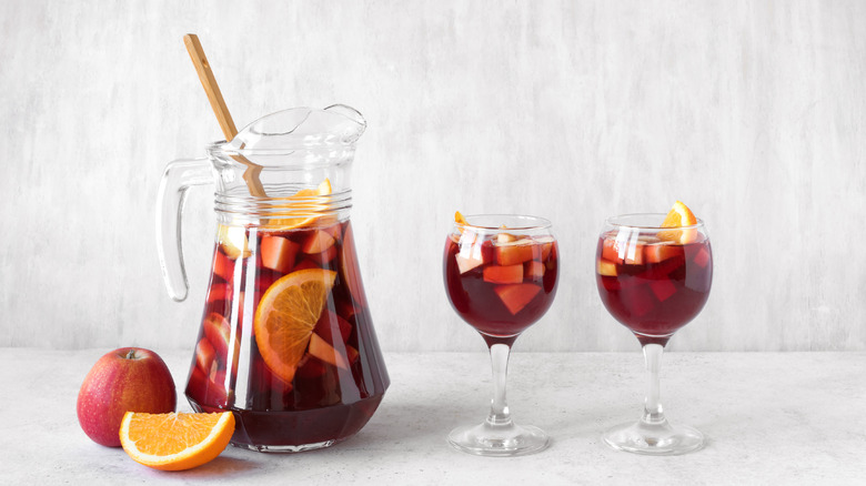 Red sangria pitcher and mugs