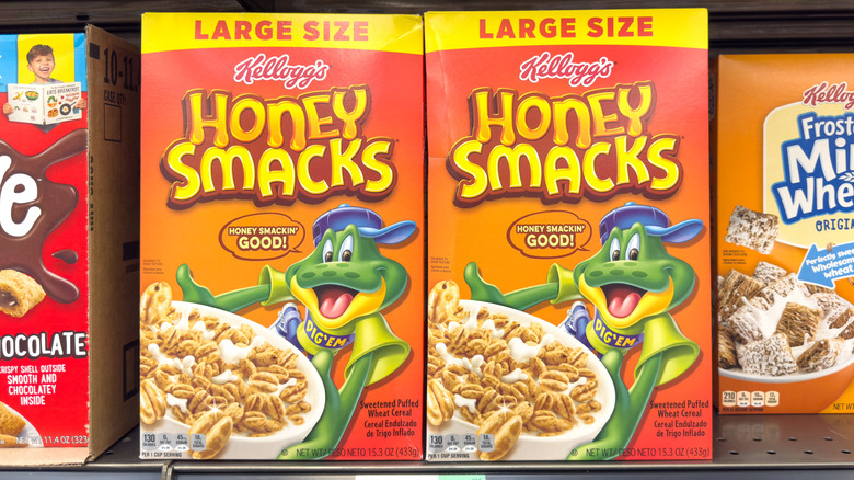 boxes of Kellogg's Honey Smacks cereal, shown on a retailer's shelves