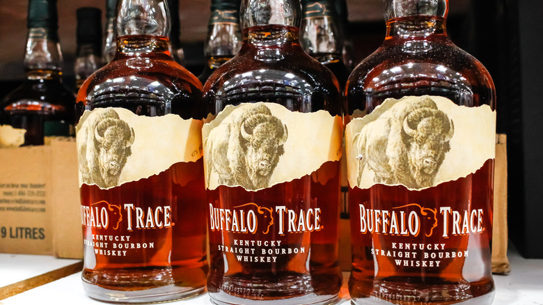 Three bottles of Buffalo Trace bourbon on shelf