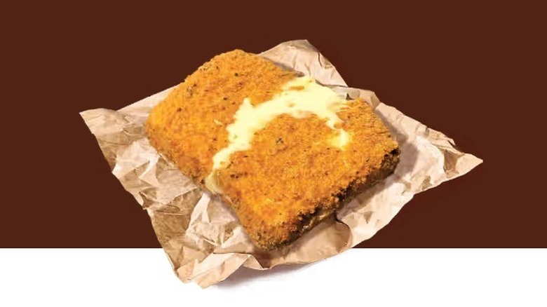 A square of breaded Oaxaca cheese