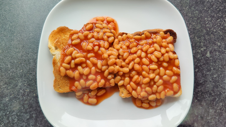 Plate of baked beans on toast
