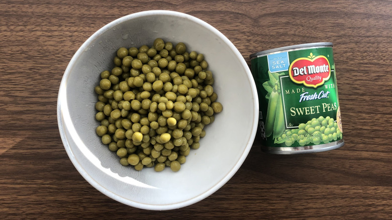 Del Monte canned fresh cut sweet peas in a bowl.