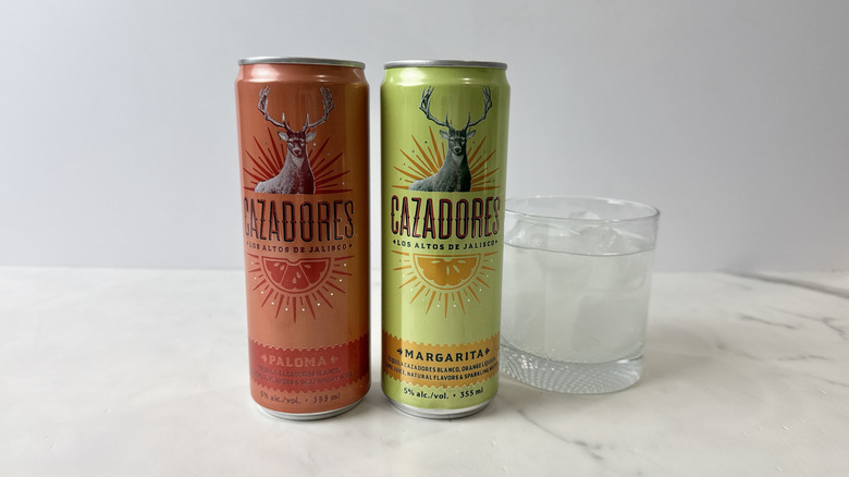 cans of Cazadores tequila cocktails and glass with cocktail