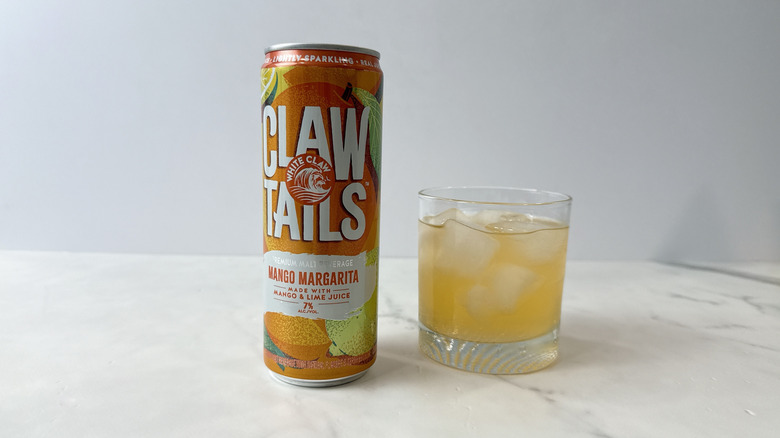 can of Claw Tails and cocktail on the side