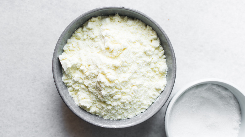 Powdered milk in grey bowl
