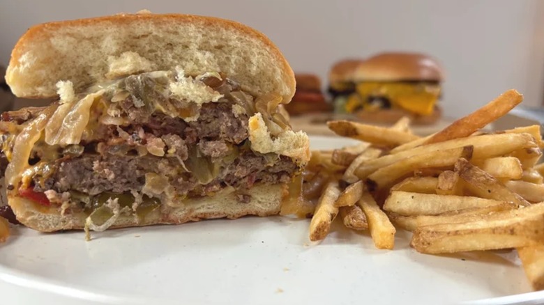 Bacon Smashed Hatched Chile Burger sliced in half