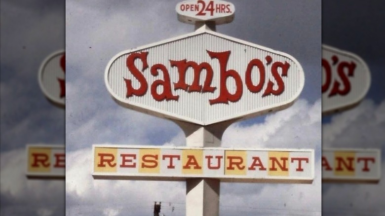 Sambo's sign in front of cloudy sky
