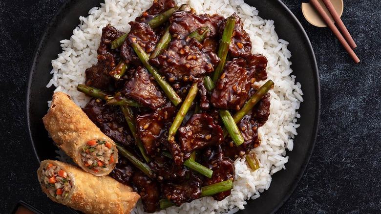 P.F. Chang's beef dish with rice and an egg roll