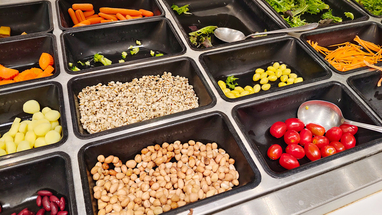 Fresh colorful vegetables at restaurant salad bar