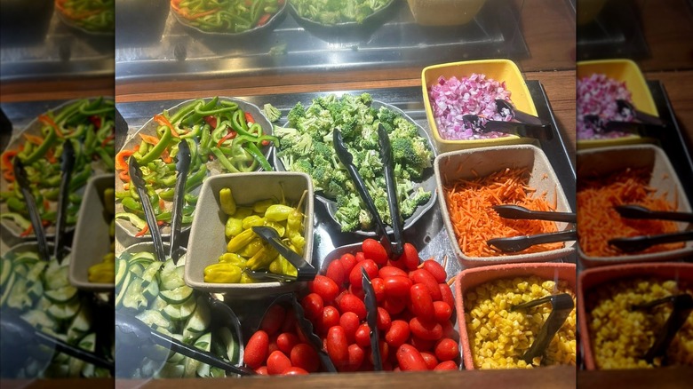 Ruby Tuesday salad bar with black tongs