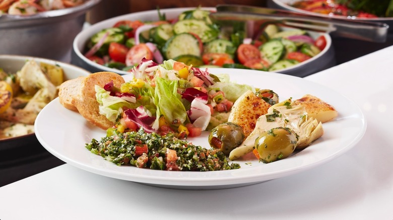 Salad on white plate at Texas de Brazil's salad bar