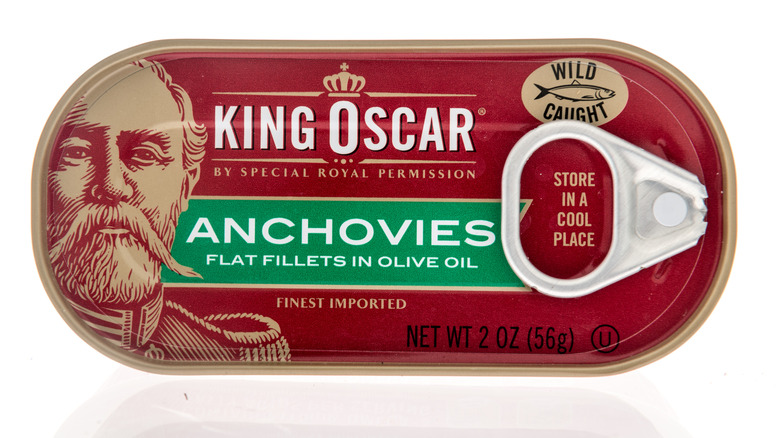 can of King Oscar anchovies on white background