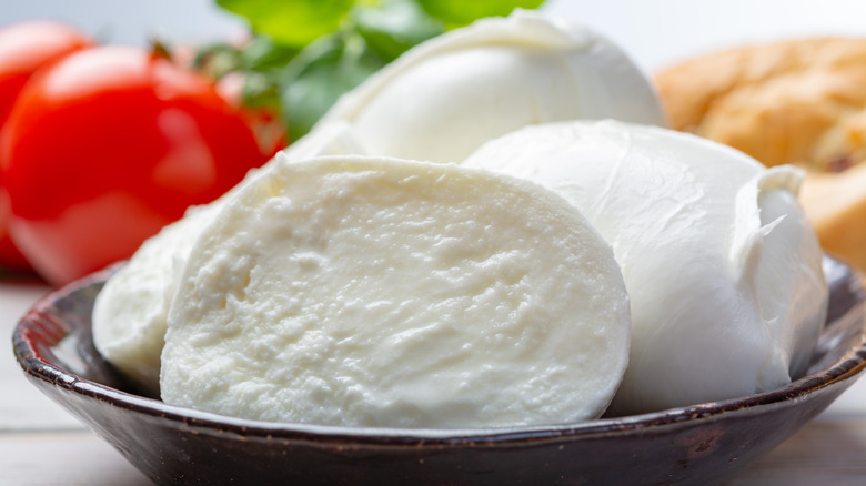 Chunks of fresh mozzarella cheese in bowl